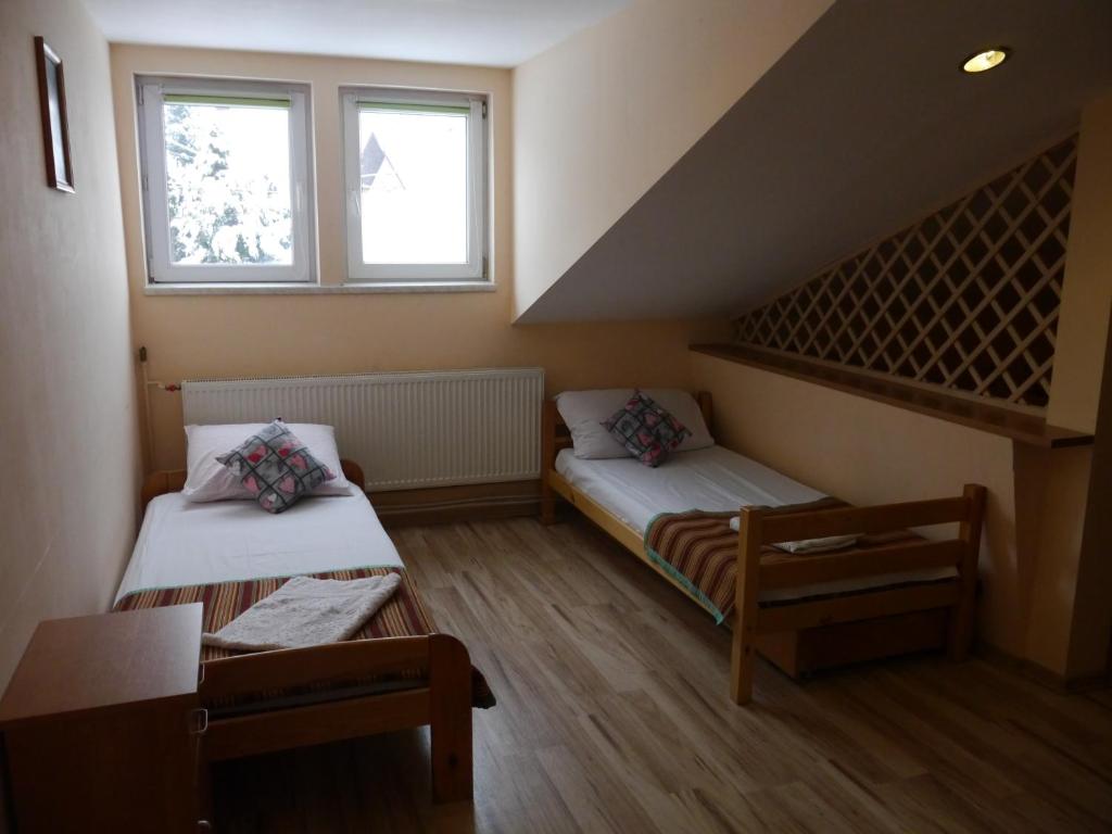 Posteľ alebo postele v izbe v ubytovaní Brama Bieszczad