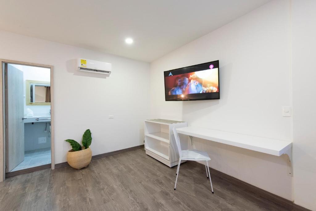 TV a/nebo společenská místnost v ubytování Medellín Vibes Hostel