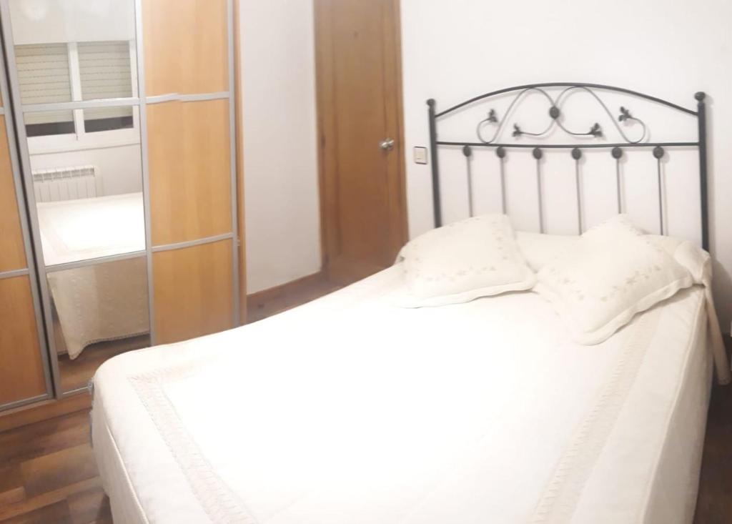 Postel nebo postele na pokoji v ubytování Enseñanza