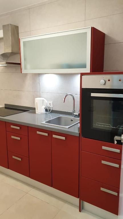 Kuchyň nebo kuchyňský kout v ubytování Apartamento Plaza Manila