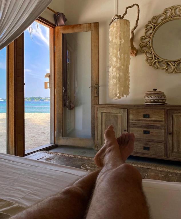Postel nebo postele na pokoji v ubytování Samura Maldives Guest House Thulusdhoo