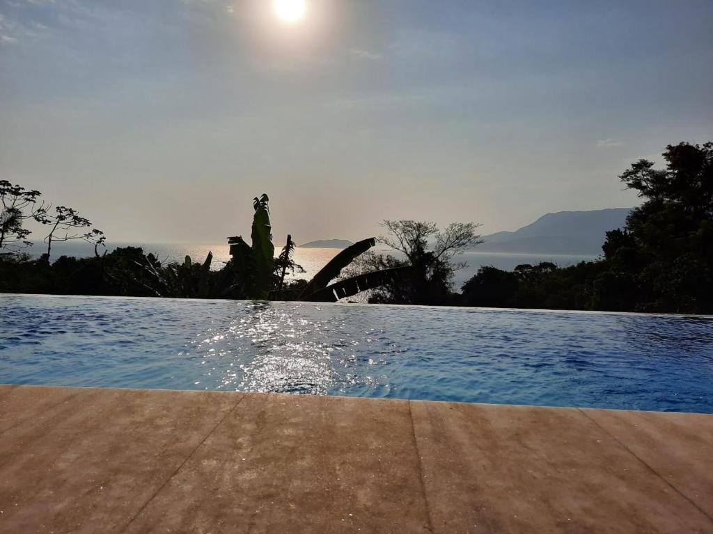  CASA EM CONDOMÍNIO COM VISTA PARA O MAR