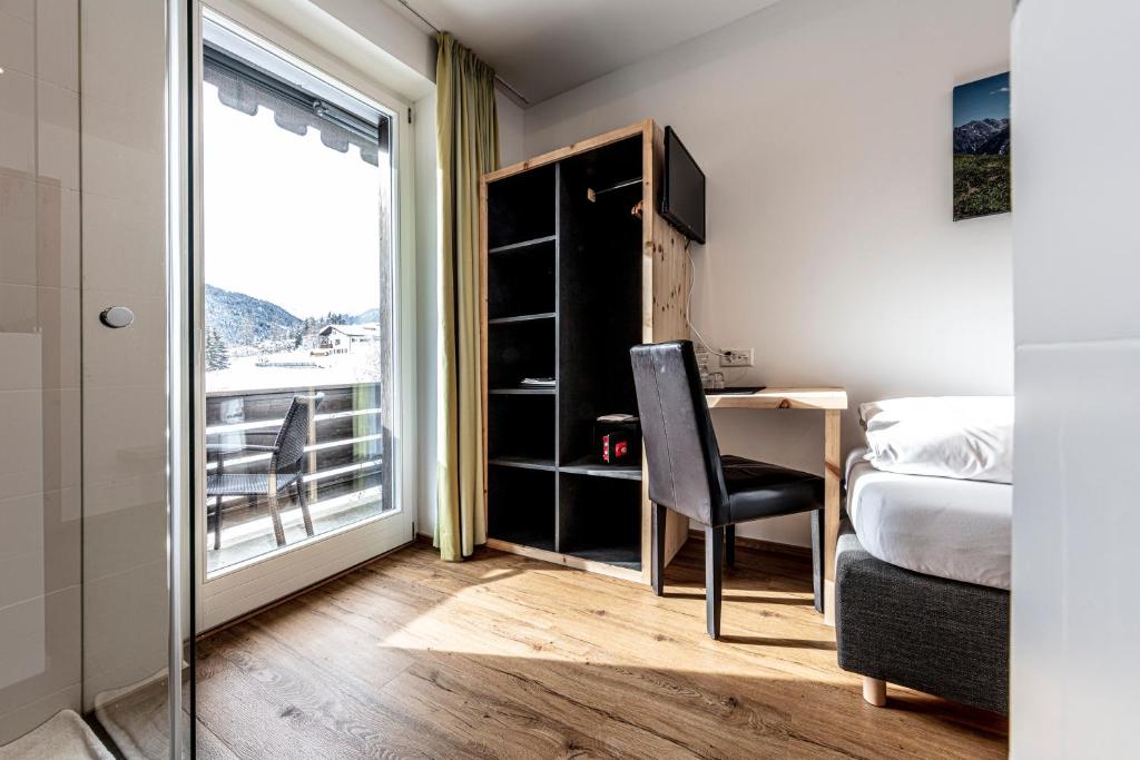 Postel nebo postele na pokoji v ubytování Hotel Filli