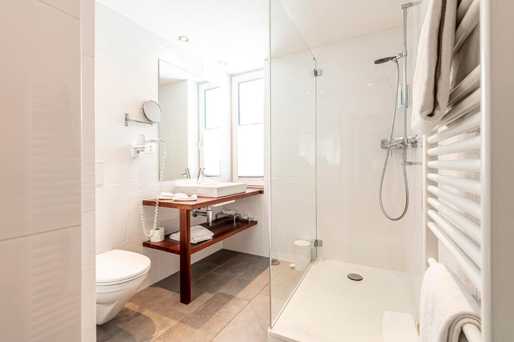 Koupelna v ubytování Hotel Filli
