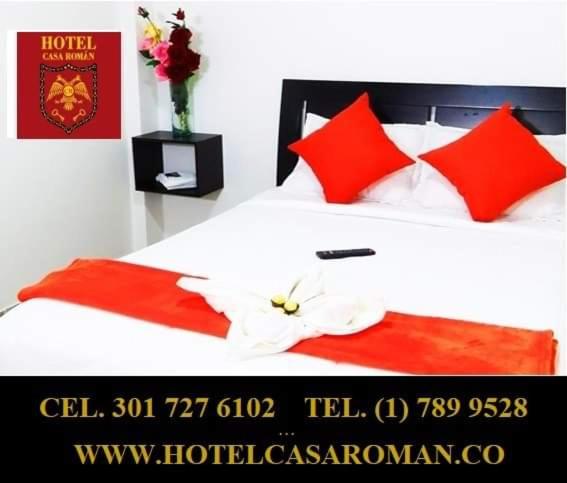A bed or beds in a room at Hotel Casa Román