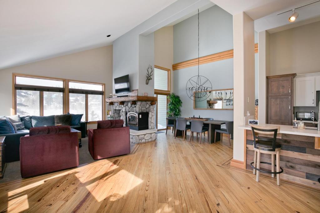 a large living room with a couch and a table at Snowcreek V 733 in Mammoth Lakes