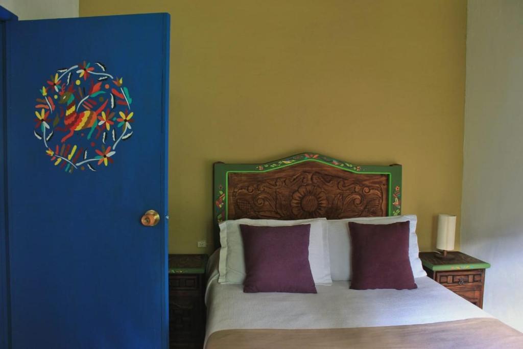 Postel nebo postele na pokoji v ubytování Spa Holistico Real Hotel