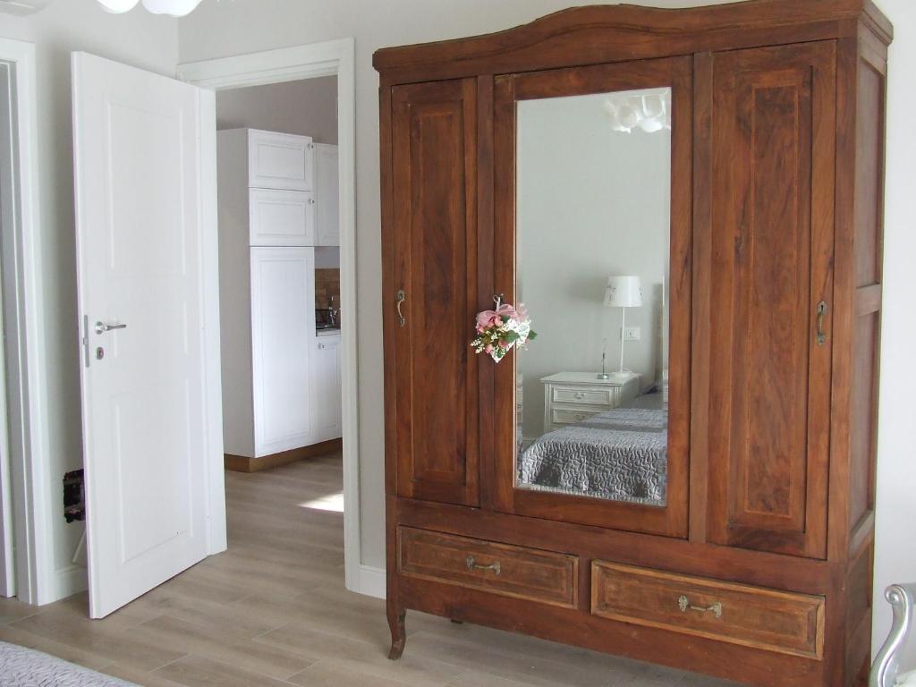 A bed or beds in a room at Bilocale Papavero, Magnolia o Girasole