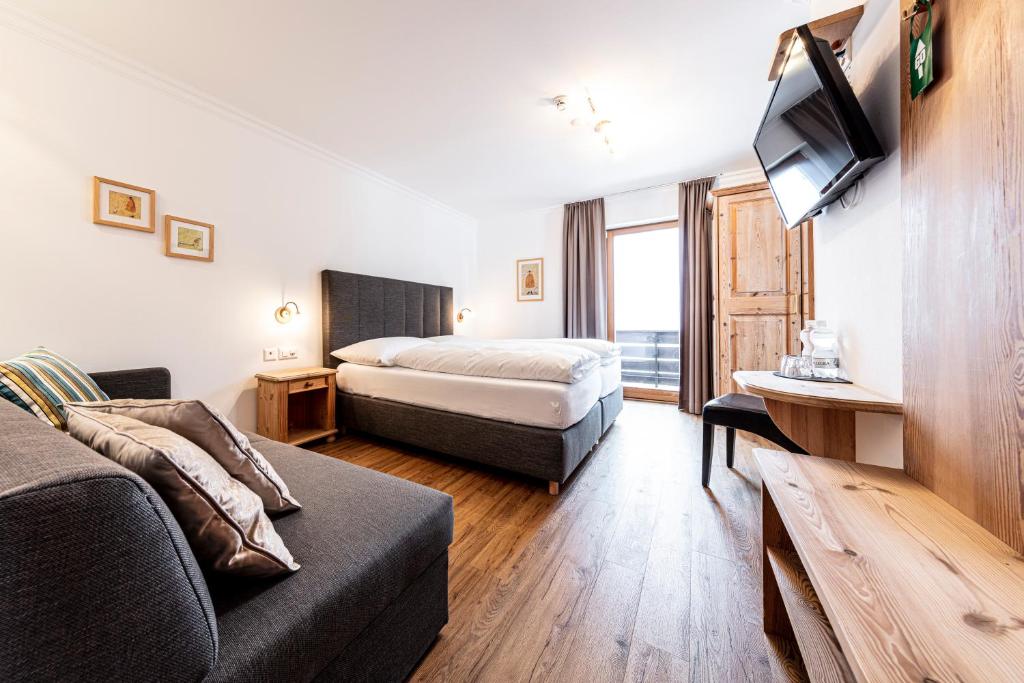 Postel nebo postele na pokoji v ubytování Hotel Filli