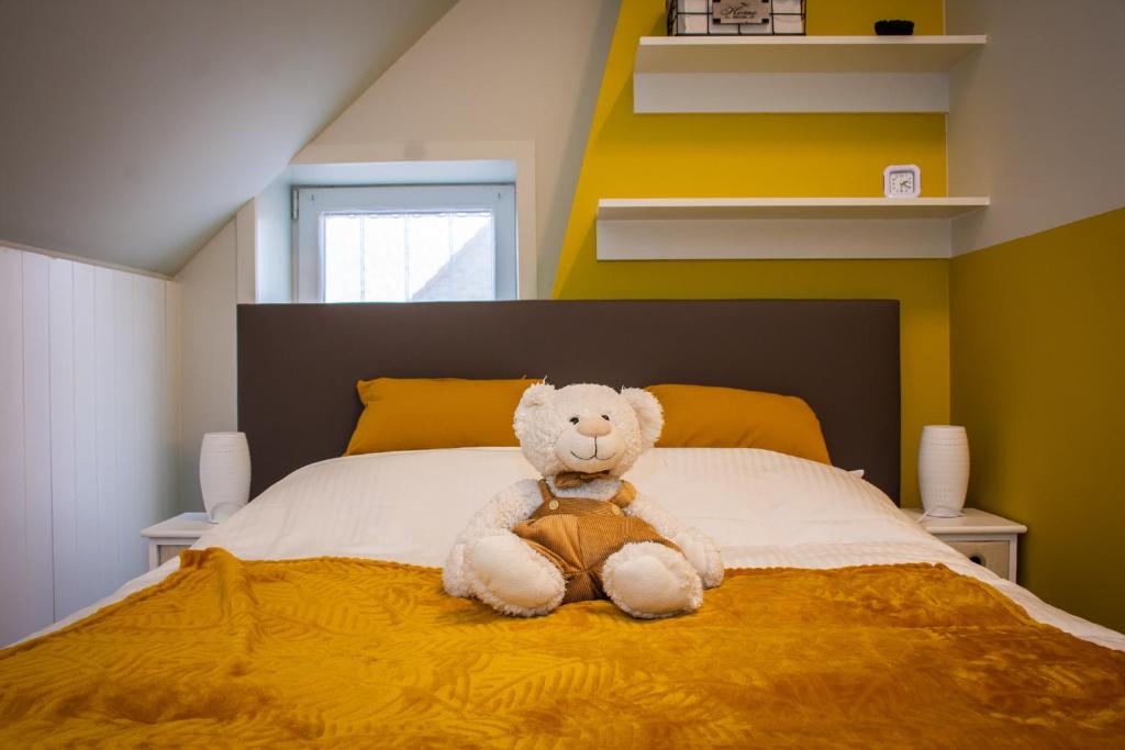 Postel nebo postele na pokoji v ubytování Huis van de Koekuit