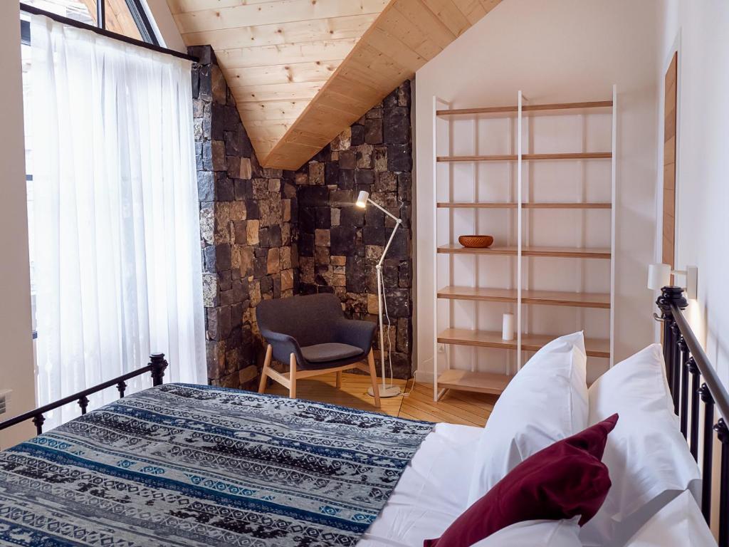 Postel nebo postele na pokoji v ubytování Dilijani Tun Hotel & Restaurant