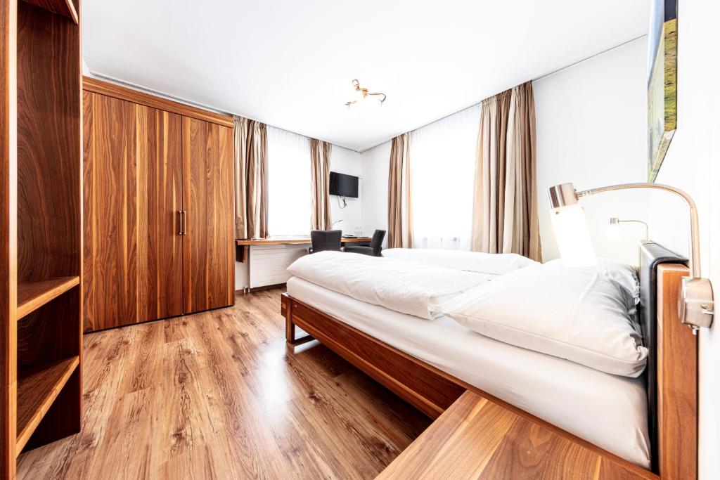 Postel nebo postele na pokoji v ubytování Hotel Filli