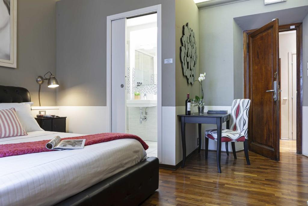 A bed or beds in a room at B&B Prestigia Rooms