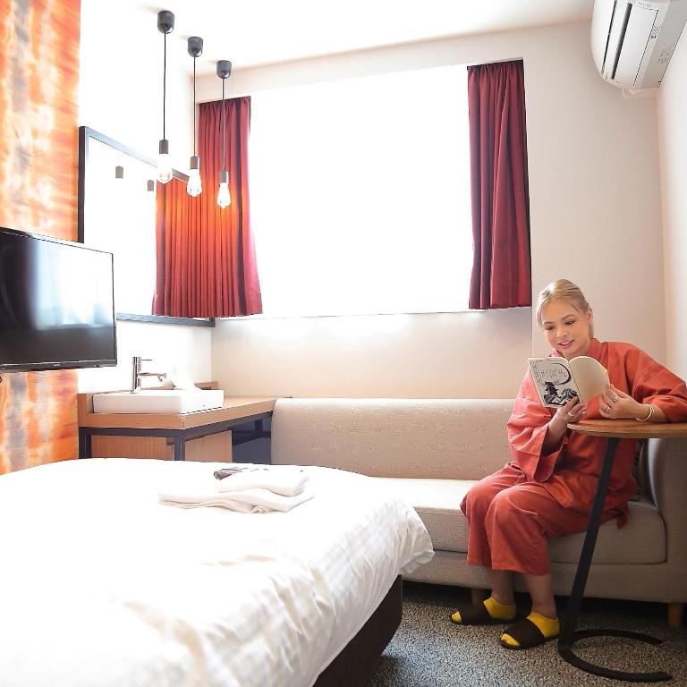 Postel nebo postele na pokoji v ubytování Hatago COEDOYA