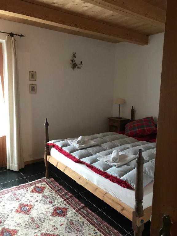 Postel nebo postele na pokoji v ubytování Chalet Charm