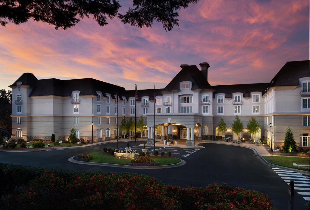 a rendering of a hotel at dusk at Chateau Elan Winery in Braselton