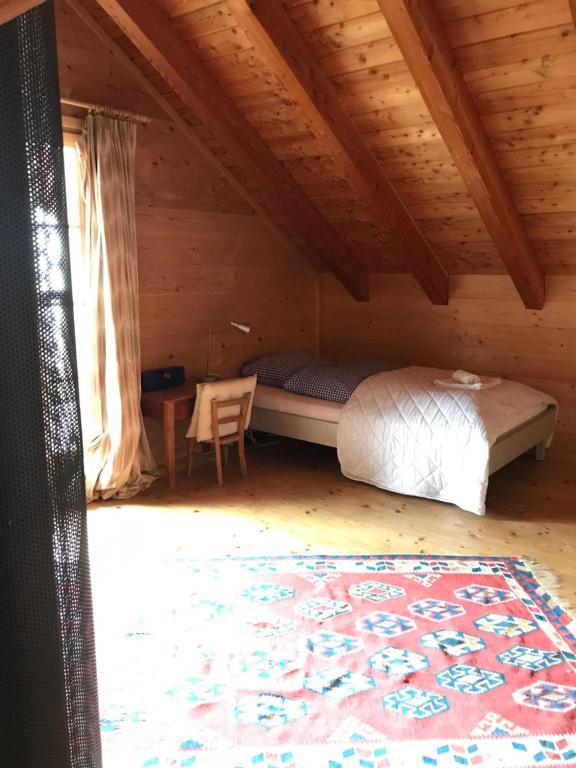 Postel nebo postele na pokoji v ubytování Chalet Charm