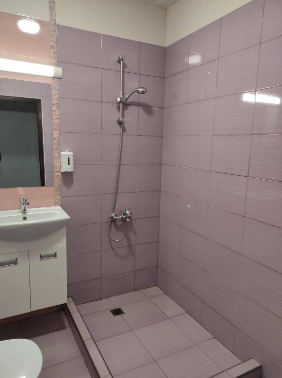 Koupelna v ubytování BeLApartment