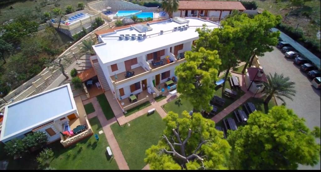 an aerial view of a large house with a pool at Residence Olimpia in Peschici
