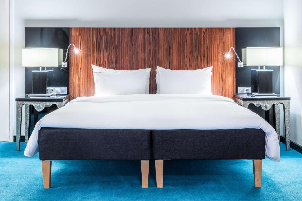 Postel nebo postele na pokoji v ubytování Radisson Blu Hotel Malmö