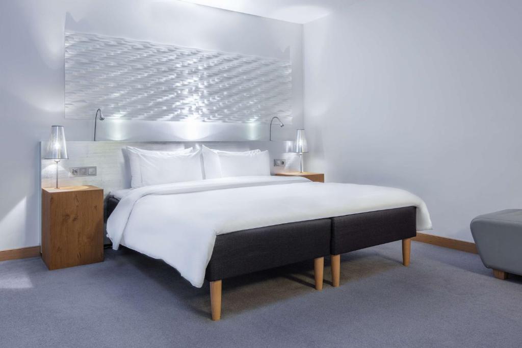 Postel nebo postele na pokoji v ubytování Radisson Blu Hotel Malmö