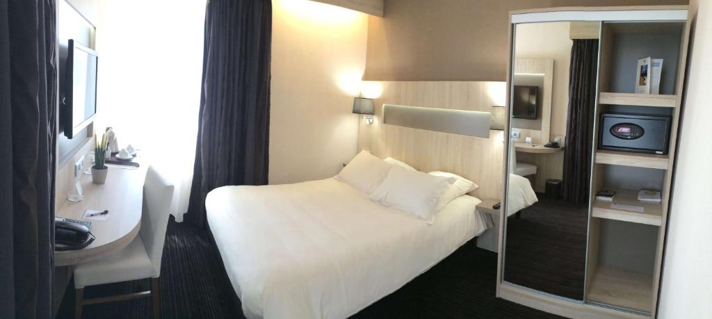 Postel nebo postele na pokoji v ubytování Best Western Marseille Aeroport