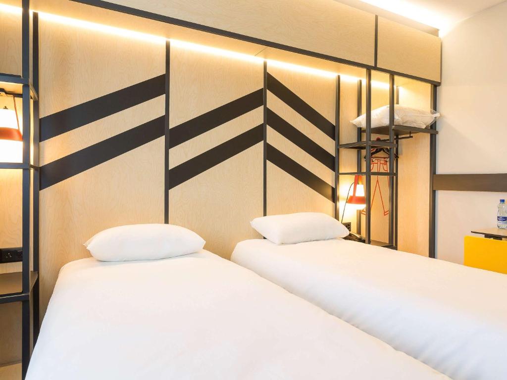Postel nebo postele na pokoji v ubytování ibis Styles Geneve Palexpo Aeroport