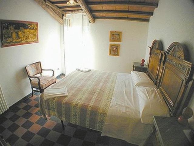Postel nebo postele na pokoji v ubytování Hotel Gianni Franzi