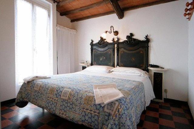 Postel nebo postele na pokoji v ubytování Hotel Gianni Franzi