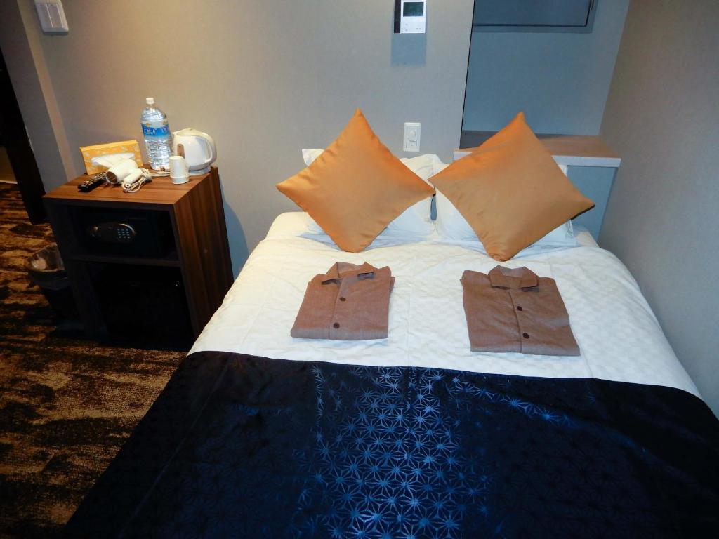 Postel nebo postele na pokoji v ubytování Hotel S-Presso North