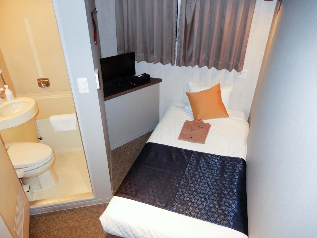 Postel nebo postele na pokoji v ubytování Hotel S-Presso North