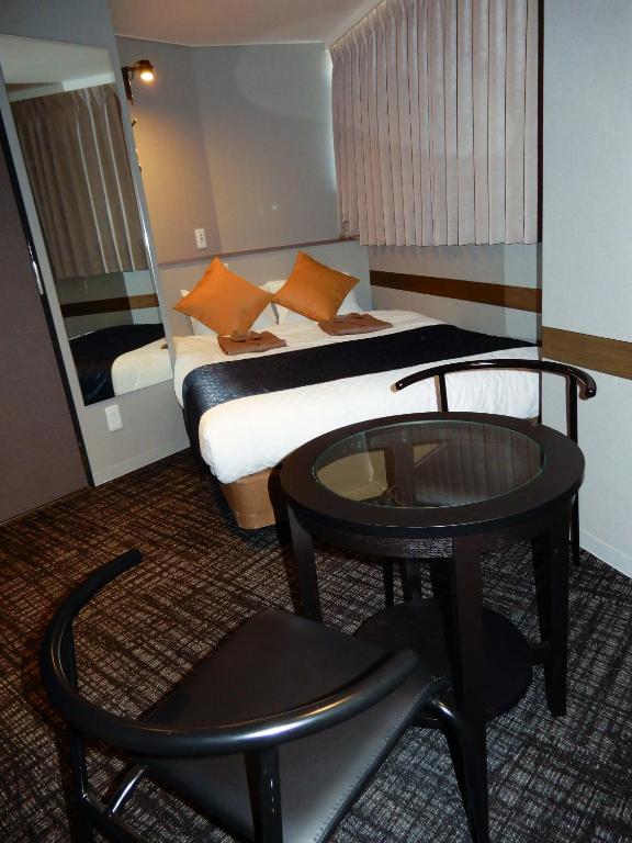 Postel nebo postele na pokoji v ubytování Hotel S-Presso North