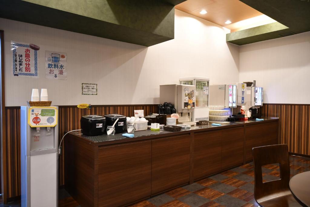 Příslušenství pro přípravu čaje a kávy v ubytování Bell's Inn Tsuchiura