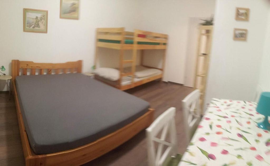 Postel nebo postele na pokoji v ubytování Esztergom Central