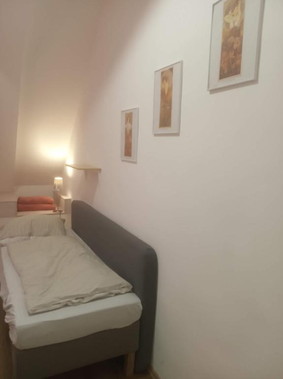 Postel nebo postele na pokoji v ubytování Esztergom Central