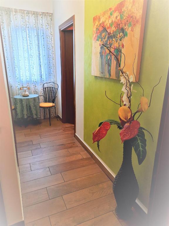 Televízia a/alebo spoločenská miestnosť v ubytovaní Florivana Boutique Hotel Ristorante