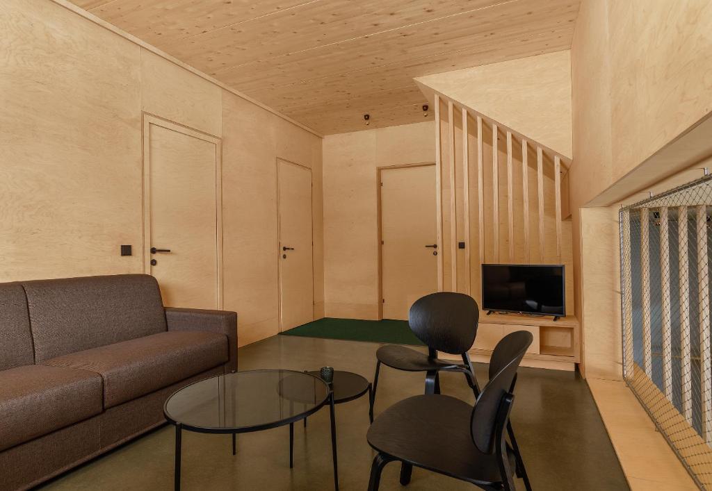 Televízia a/alebo spoločenská miestnosť v ubytovaní Apartment Hoamelig