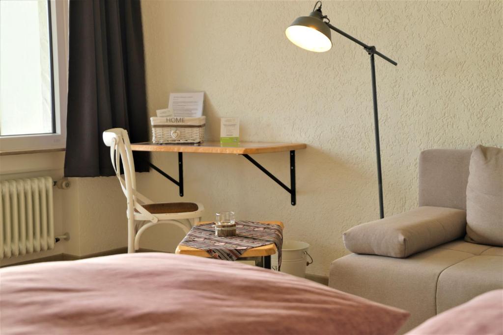 Postel nebo postele na pokoji v ubytování Landpension Pferdekoppel - B&B - Self Checkin