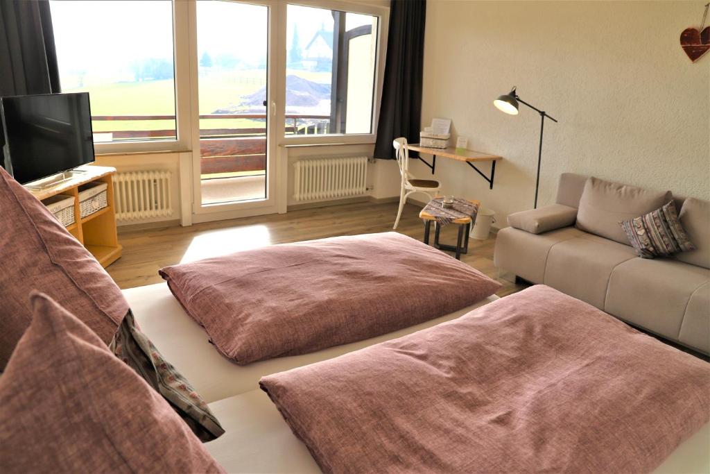 Posezení v ubytování Landpension Pferdekoppel - B&B - Self Checkin