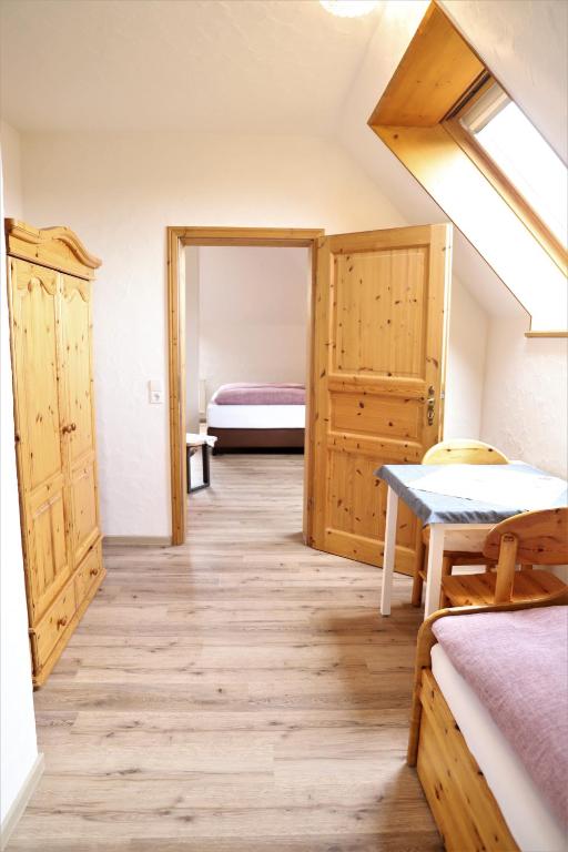 Postel nebo postele na pokoji v ubytování Landpension Pferdekoppel - B&B - Self Checkin