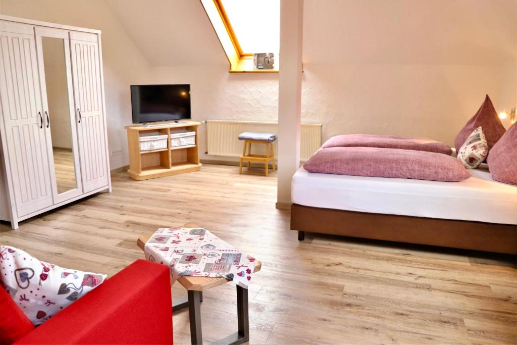 Postel nebo postele na pokoji v ubytování Landpension Pferdekoppel - B&B - Self Checkin