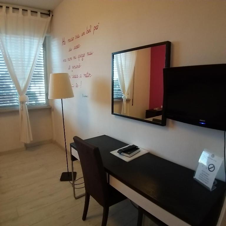 TV a/nebo společenská místnost v ubytování Cavalieri del Tau