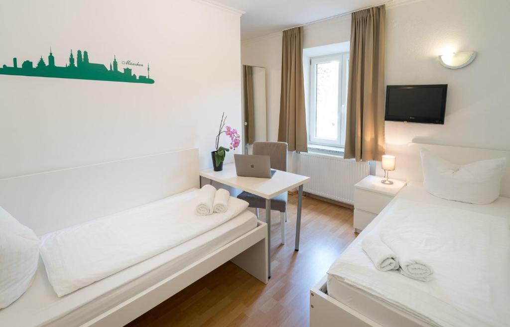 Postel nebo postele na pokoji v ubytování guenstigschlafen24 – die günstige Alternative zum Hotel