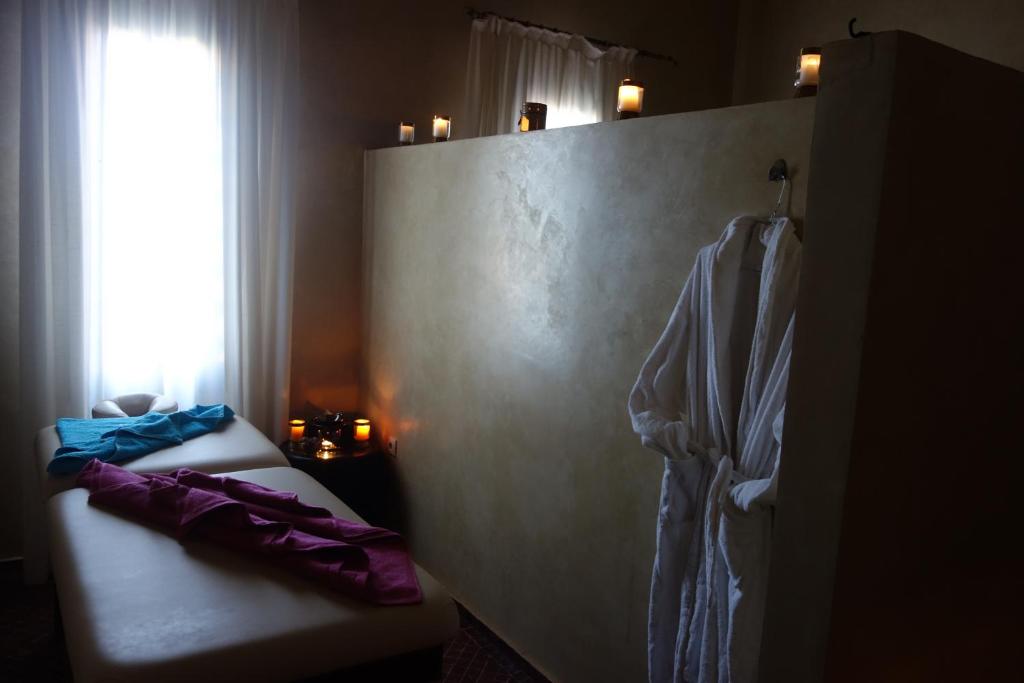 Postel nebo postele na pokoji v ubytování Boutique Hôtel palais Masandoia