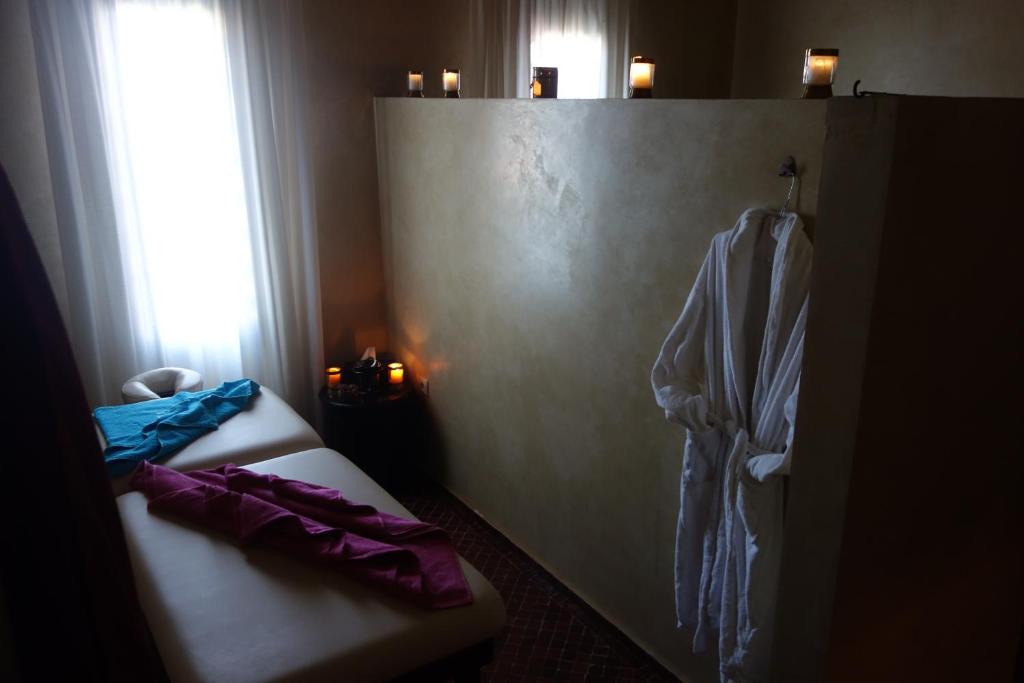 Postel nebo postele na pokoji v ubytování Boutique Hôtel palais Masandoia