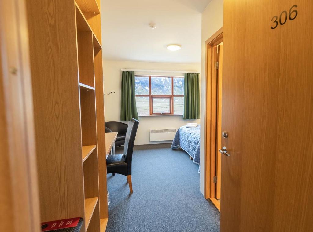Postel nebo postele na pokoji v ubytování Adventure Hotel Geirland
