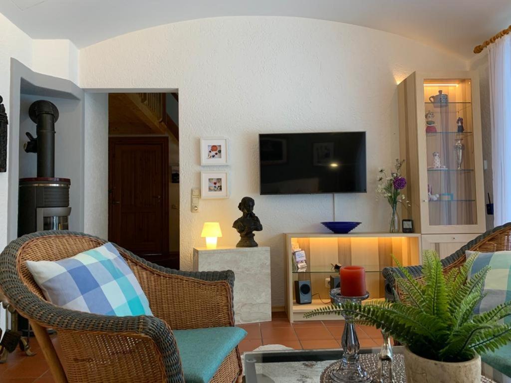 TV a/nebo společenská místnost v ubytování Ferienhaus Marianne Kroschinski