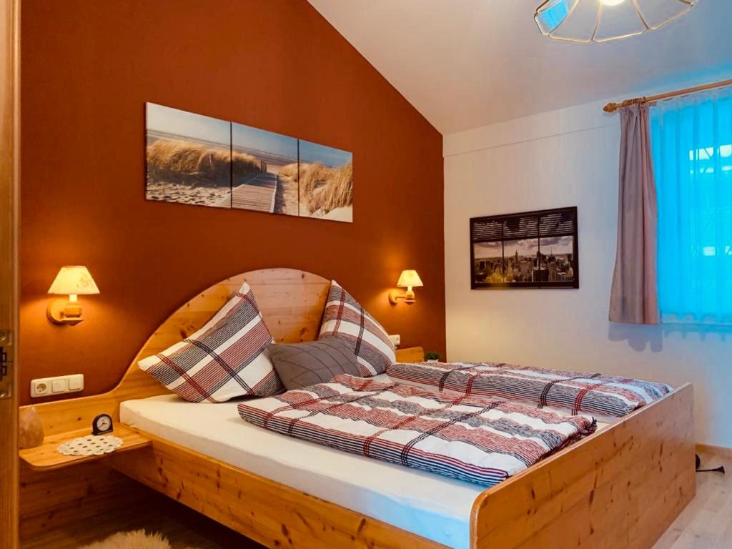 Postel nebo postele na pokoji v ubytování Ferienhaus Marianne Kroschinski