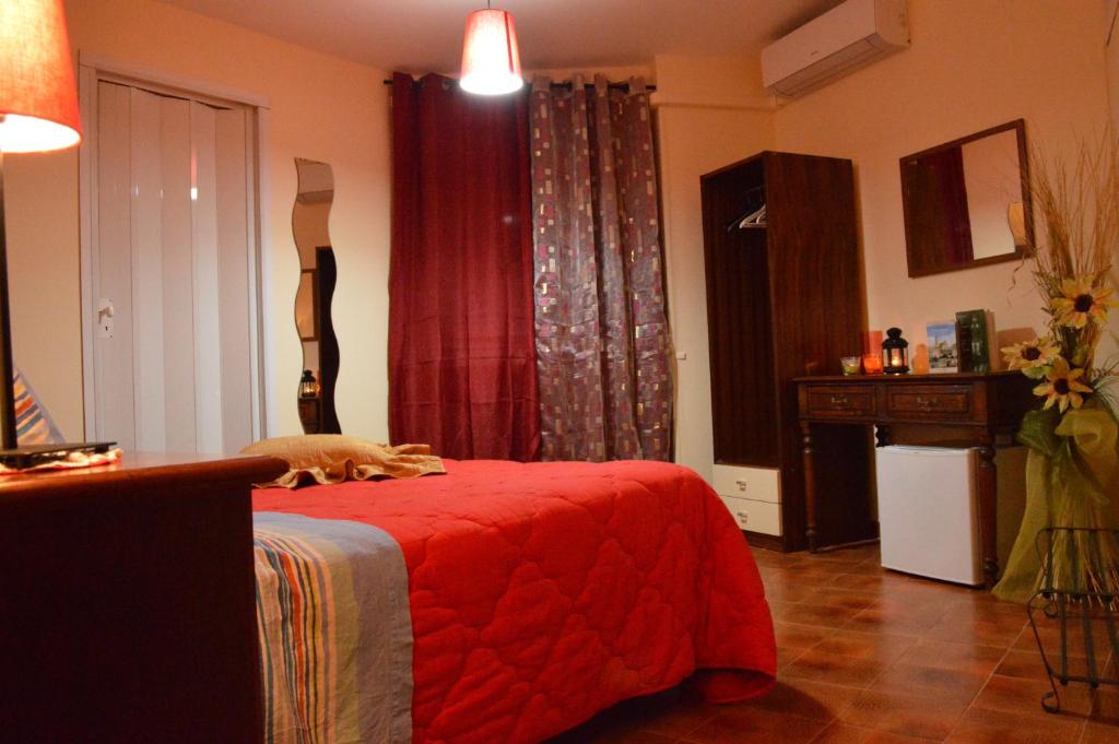 Postel nebo postele na pokoji v ubytování La Casa Nei Sassi