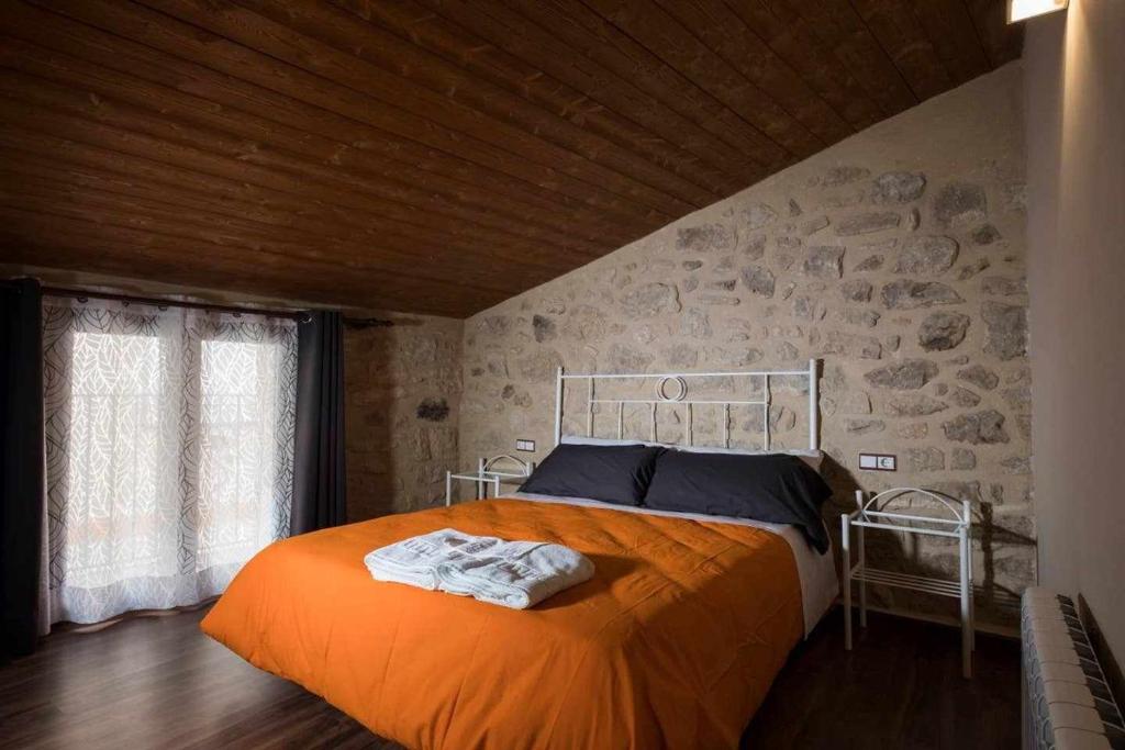 Postel nebo postele na pokoji v ubytování Casa rural Lo Niu